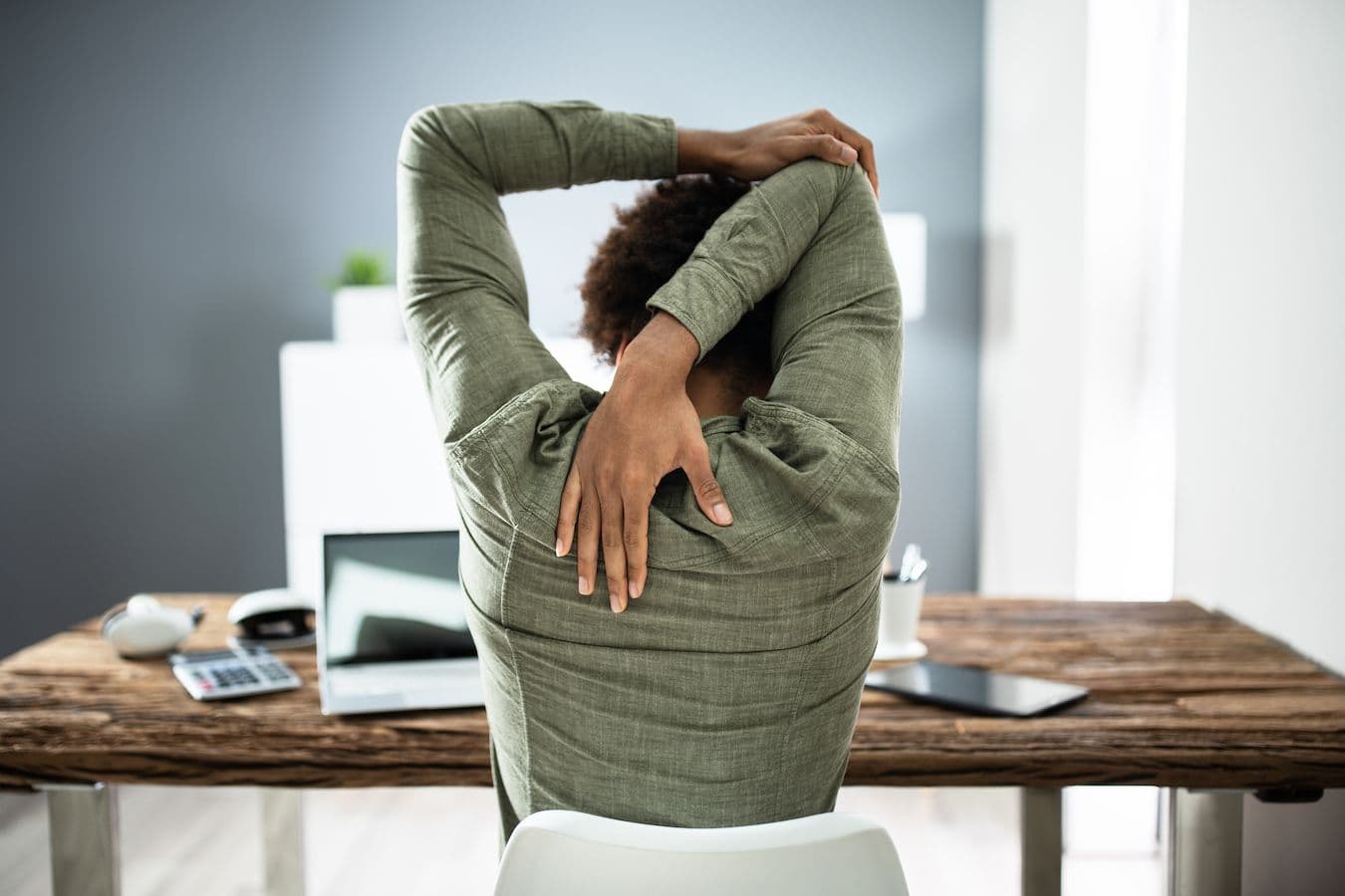 Are you a desk worker? Try this yoga routine designed to ease aches and pains