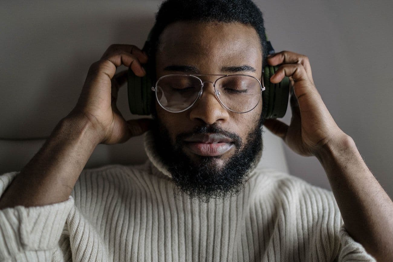 Man listening to self-hypnosis