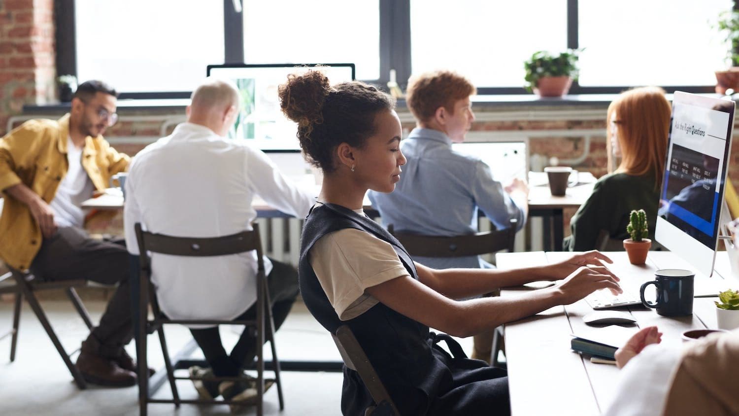 Woman working at computer in office