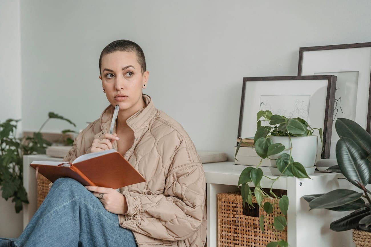 Person writing in journal