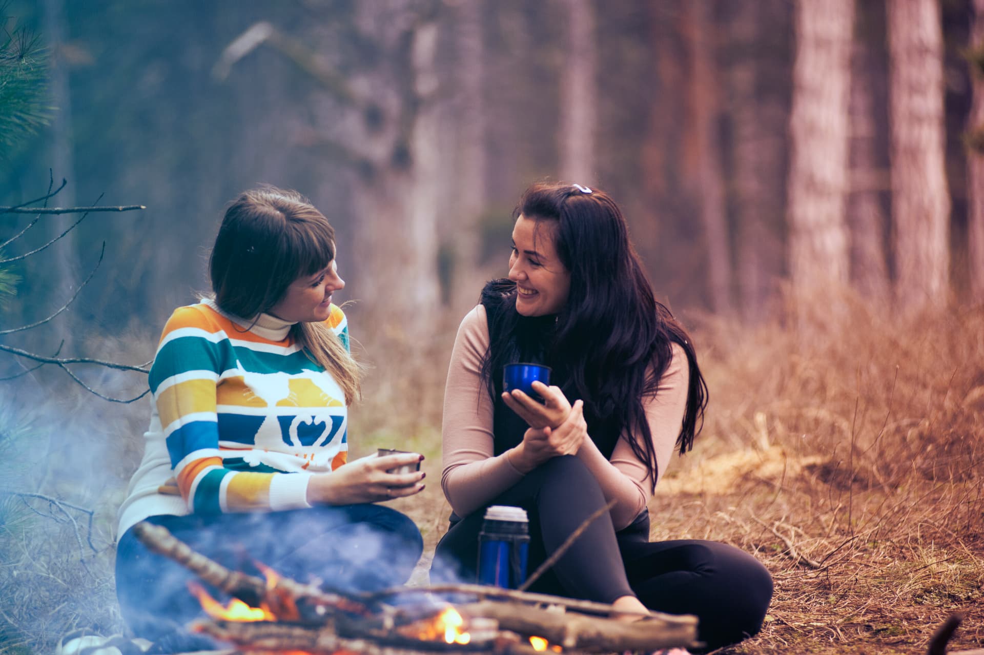 Two-women-around-a-bonfire