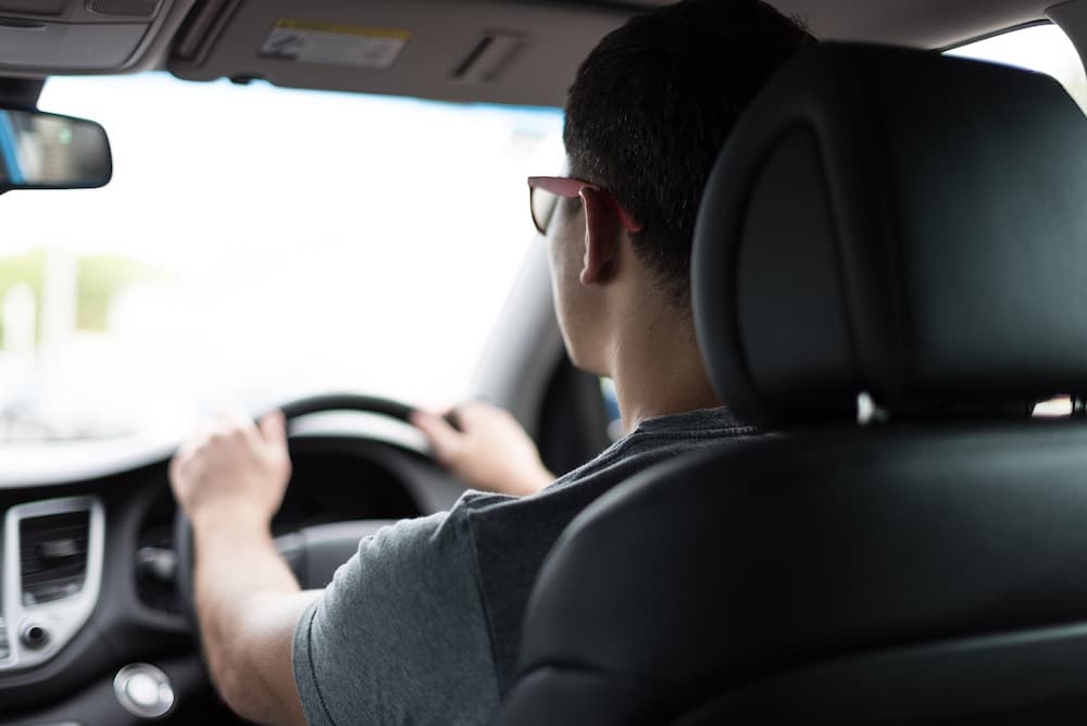 young man driving