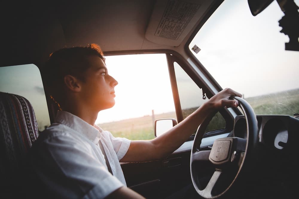 young man driving