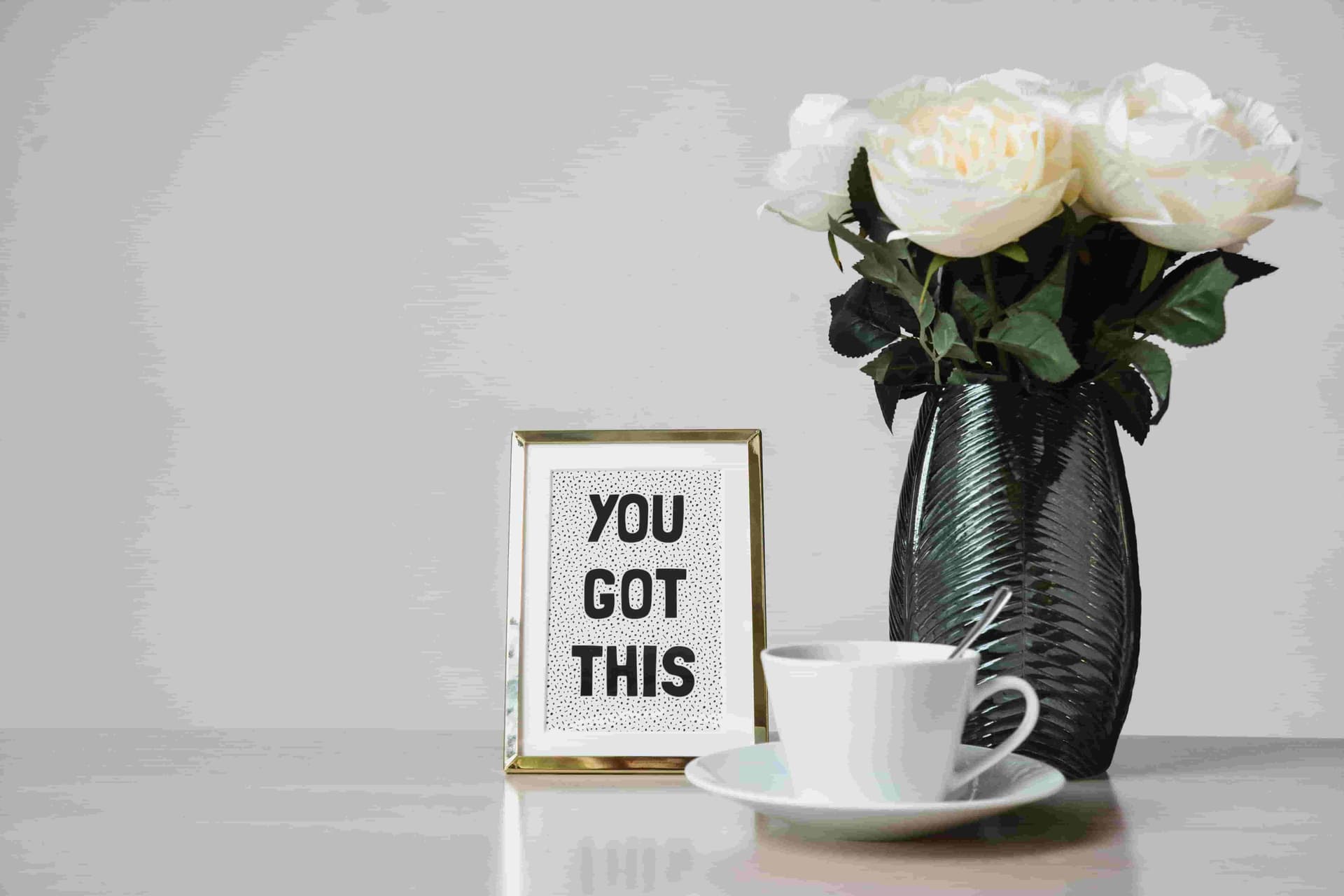 A framed motivational sign, saying 'You got this'.