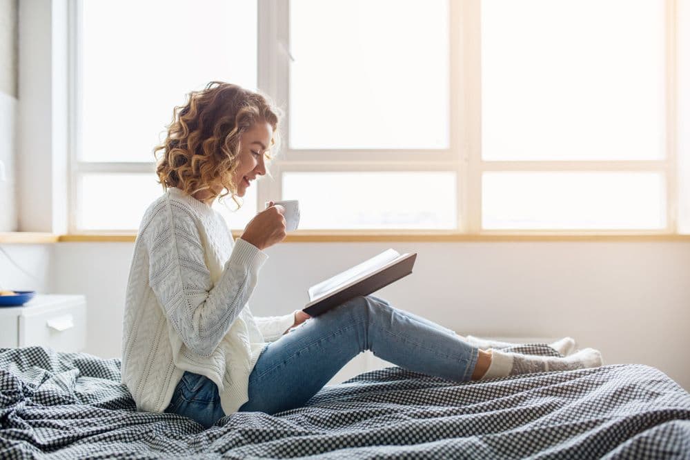 woman reading book