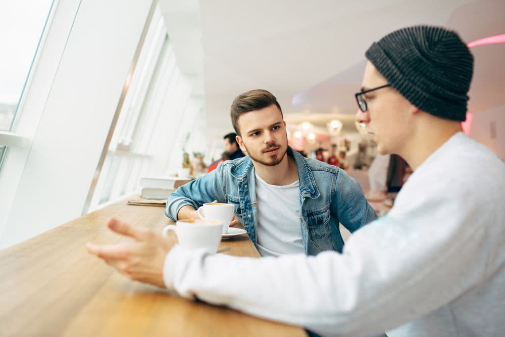 two men talking