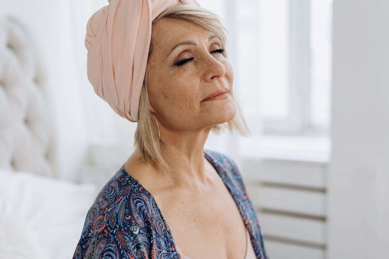 Woman with eyes closed